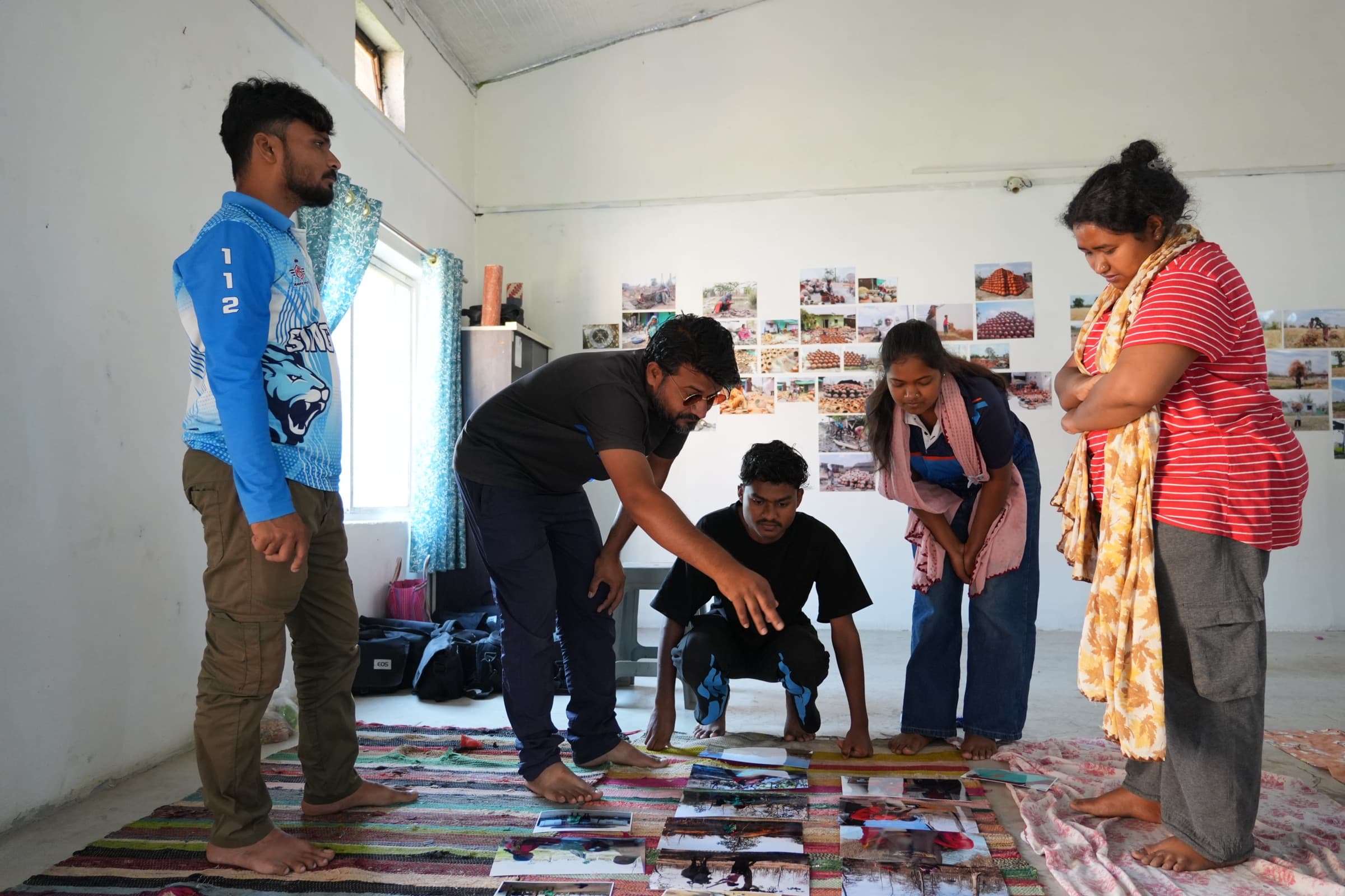 Youth handling cameras in a CICADA workshop